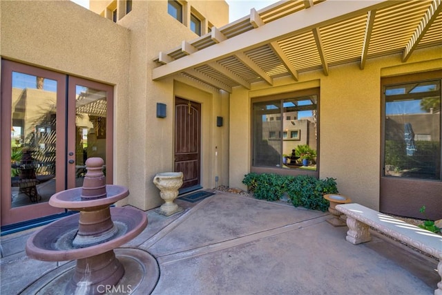 9 Via Haciendas, Rancho Mirage, CA 92270 - doorway to property featuring a patio area and stucco siding