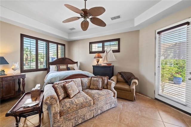 9 Via Haciendas, Rancho Mirage, CA 92270 - bedroom featuring access to outside, visible vents, a ceiling fan, and a raised ceiling