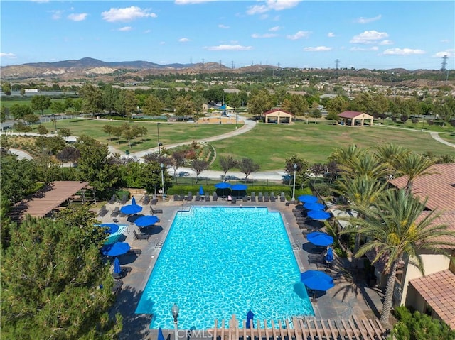 28476 Herrera St, Valencia, CA 91354 - community pool with a mountain view and a patio area