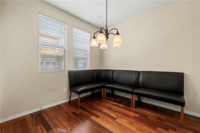 28476 Herrera St, Valencia, CA 91354 - living area with a chandelier, baseboards, and dark wood-style floors