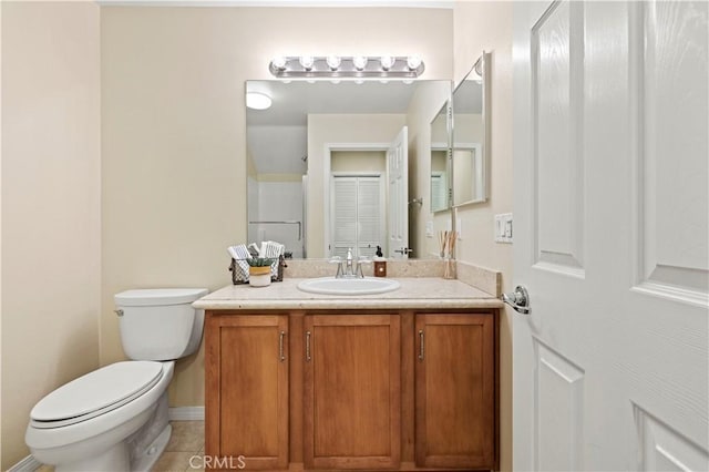 28476 Herrera St, Valencia, CA 91354 - bathroom featuring toilet, vanity, and tile patterned flooring