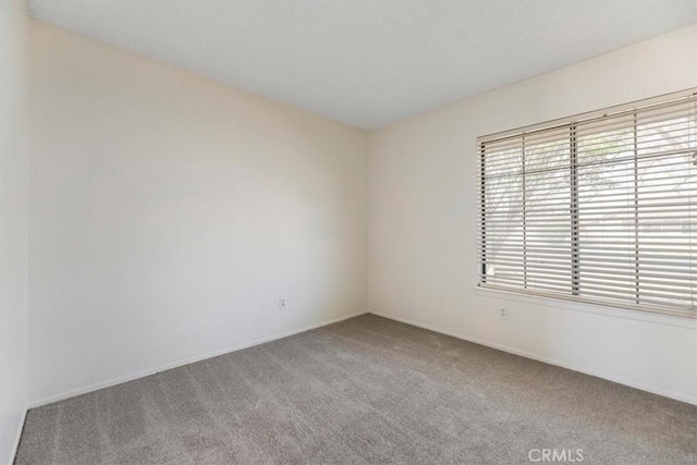 12963 Birch Glen Ct, Victorville, CA 92392 - empty room with carpet flooring and baseboards