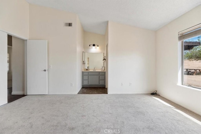 12963 Birch Glen Ct, Victorville, CA 92392 - unfurnished bedroom featuring carpet, a sink, and ensuite bath