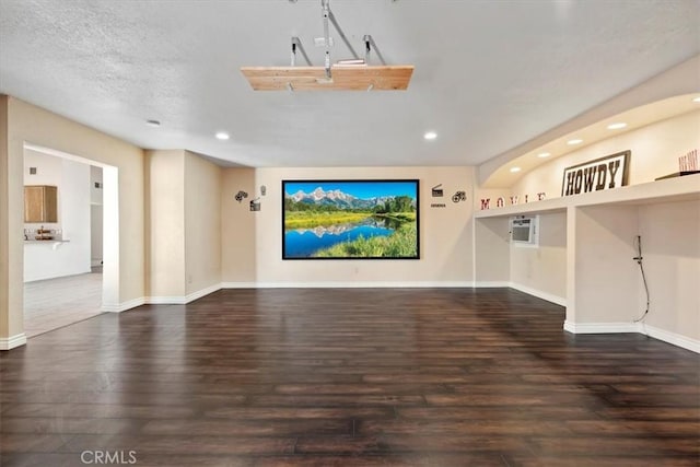 12963 Birch Glen Ct, Victorville, CA 92392 - unfurnished living room featuring recessed lighting, dark wood-style floors, baseboards, and a wall mounted air conditioner