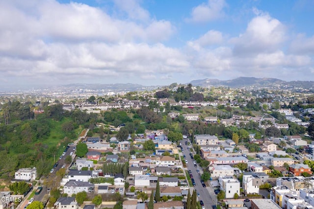 bird's eye view with a residential view and a mountain view
