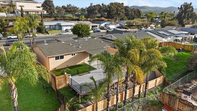 drone / aerial view featuring a mountain view and a residential view