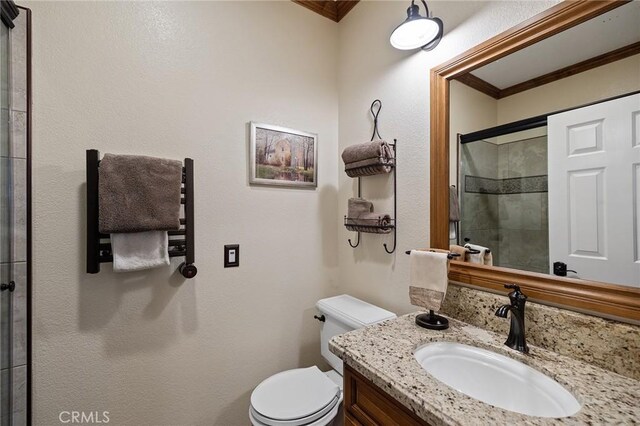 37794 Amber Ln, Murrieta, CA 92562 - full bath featuring toilet, crown molding, vanity, and a tile shower