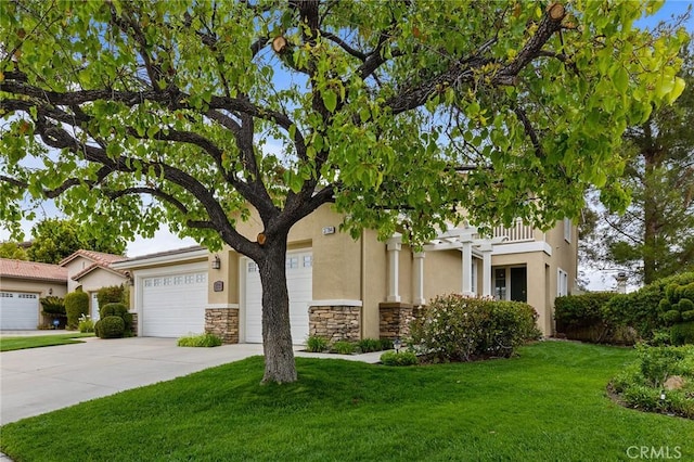 37794 Amber Ln, Murrieta, CA 92562 - view of front of house with a front yard, stone siding, a garage, concrete driveway, and stucco siding