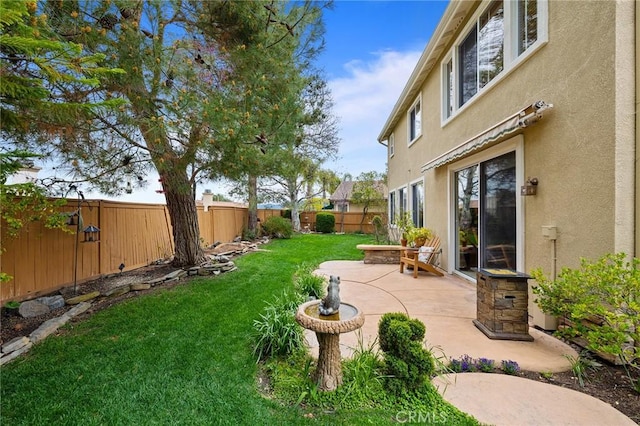 37794 Amber Ln, Murrieta, CA 92562 - view of yard with a patio area and a fenced backyard