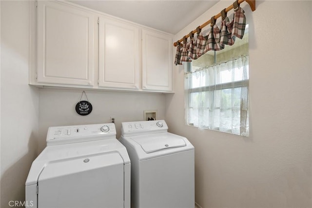 37794 Amber Ln, Murrieta, CA 92562 - laundry room with cabinet space and washer and clothes dryer