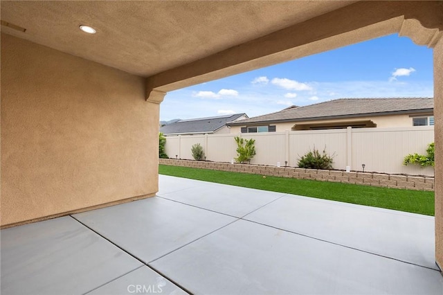 view of patio with fence