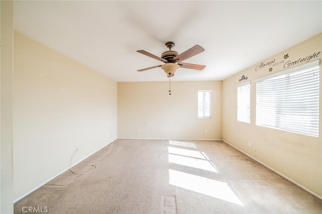 35317 Trevino Trl, Beaumont, CA 92223 - unfurnished room with baseboards, a ceiling fan, and light carpet