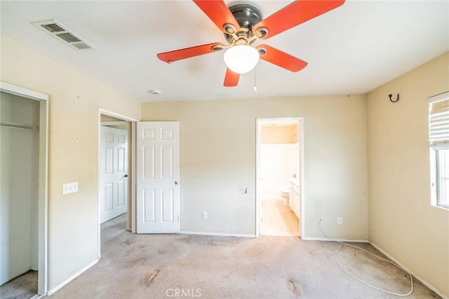35317 Trevino Trl, Beaumont, CA 92223 - unfurnished bedroom with connected bathroom, a closet, baseboards, light colored carpet, and visible vents