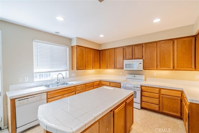 35317 Trevino Trl, Beaumont, CA 92223 - kitchen featuring recessed lighting, white appliances, a sink, tile countertops, and brown cabinetry