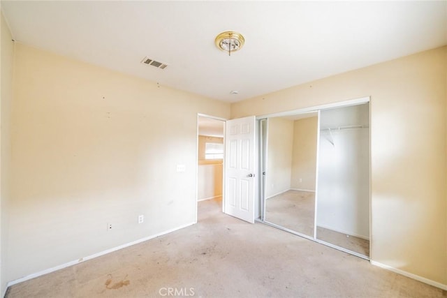 35317 Trevino Trl, Beaumont, CA 92223 - unfurnished bedroom with baseboards, visible vents, a closet, and carpet flooring