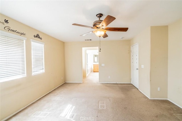 35317 Trevino Trl, Beaumont, CA 92223 - empty room with baseboards, ceiling fan, visible vents, and light colored carpet
