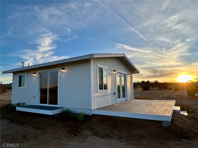 back of property featuring a deck