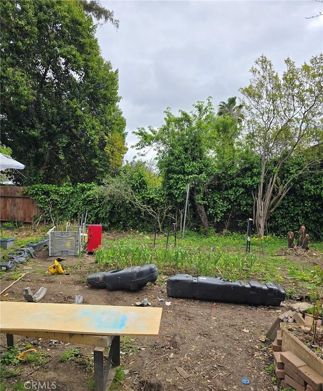 view of yard with fence