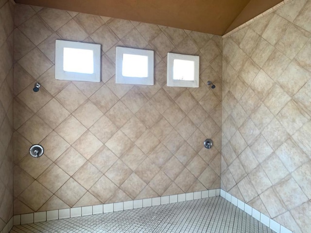 2668 Escala Cir, San Diego, CA 92108 - full bathroom featuring a tile shower and vaulted ceiling