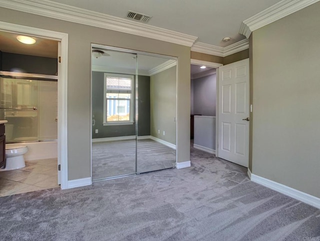2668 Escala Cir, San Diego, CA 92108 - unfurnished bedroom with a closet, crown molding, visible vents, carpet, and baseboards