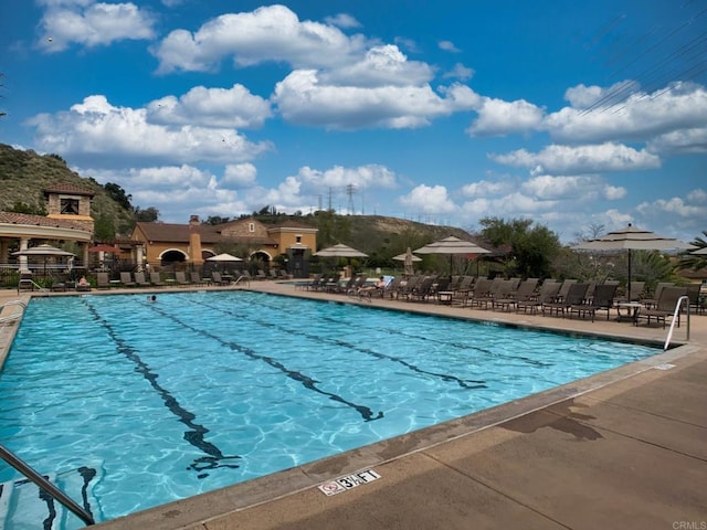 2668 Escala Cir, San Diego, CA 92108 - pool featuring a patio area and fence
