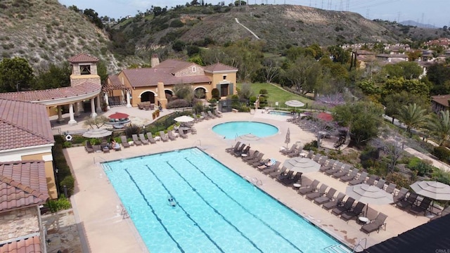 2668 Escala Cir, San Diego, CA 92108 - community pool with a mountain view and a patio area