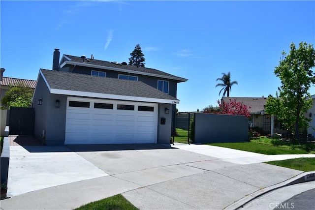 23408 Dorset Pl, Harbor City, CA 90710 - traditional-style house with stucco siding, a garage, concrete driveway, and fence