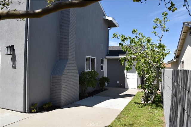 23408 Dorset Pl, Harbor City, CA 90710 - view of home's exterior featuring stucco siding and fence