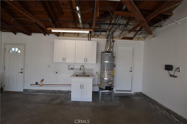 23408 Dorset Pl, Harbor City, CA 90710 - garage featuring baseboards, a sink, and secured water heater