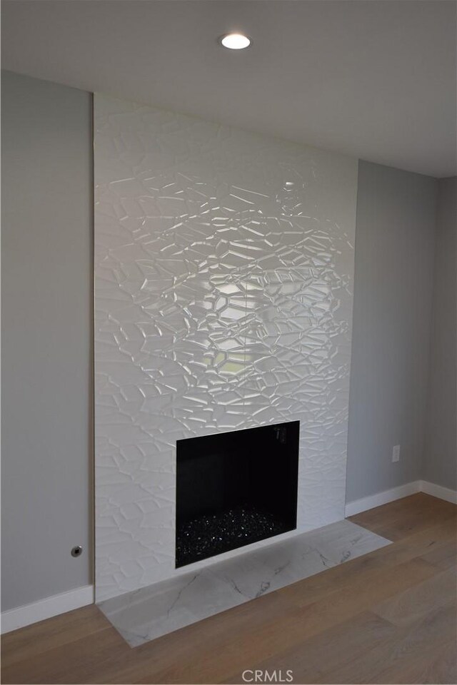 23408 Dorset Pl, Harbor City, CA 90710 - interior details with a fireplace with flush hearth, baseboards, wood finished floors, and recessed lighting