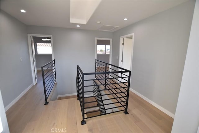 23408 Dorset Pl, Harbor City, CA 90710 - stairway featuring a wealth of natural light, wood finished floors, and baseboards