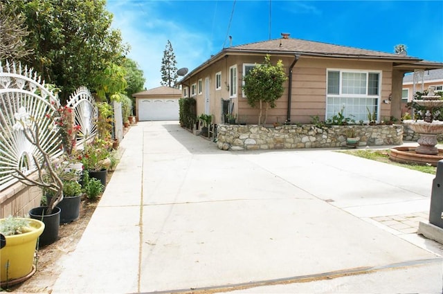3724 W 105th St, Inglewood, CA 90303 - view of property exterior with a detached garage and an outbuilding