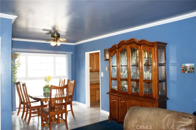 3724 W 105th St, Inglewood, CA 90303 - dining space featuring a ceiling fan, tile patterned floors, and ornamental molding