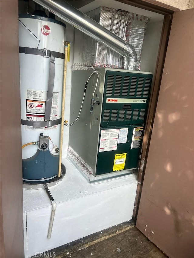 764 W 18th St, Costa Mesa, CA 92627 - utility room with strapped water heater