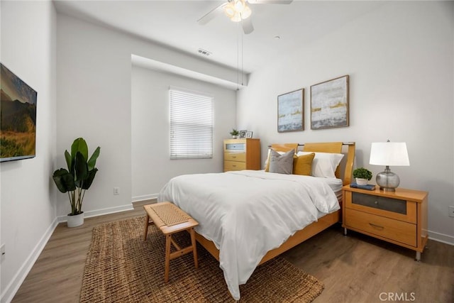 144 Borrego, Irvine, CA 92618 - bedroom with baseboards, visible vents, wood finished floors, and a ceiling fan