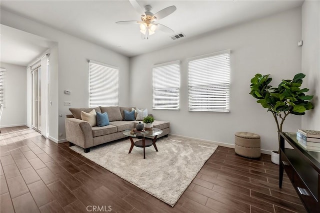 144 Borrego, Irvine, CA 92618 - living area featuring baseboards, ceiling fan, visible vents, and wood finished floors