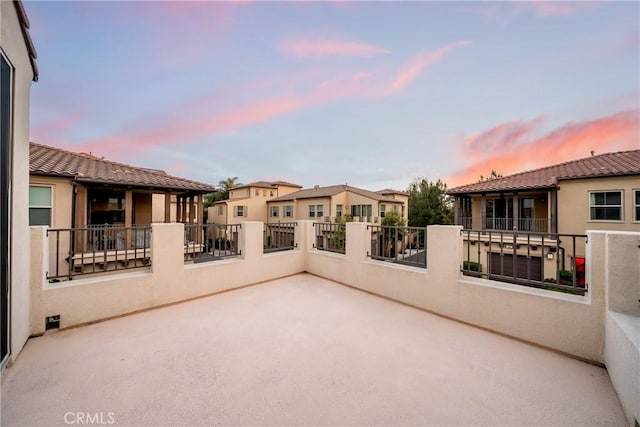 144 Borrego, Irvine, CA 92618 - view of patio featuring a balcony and a residential view