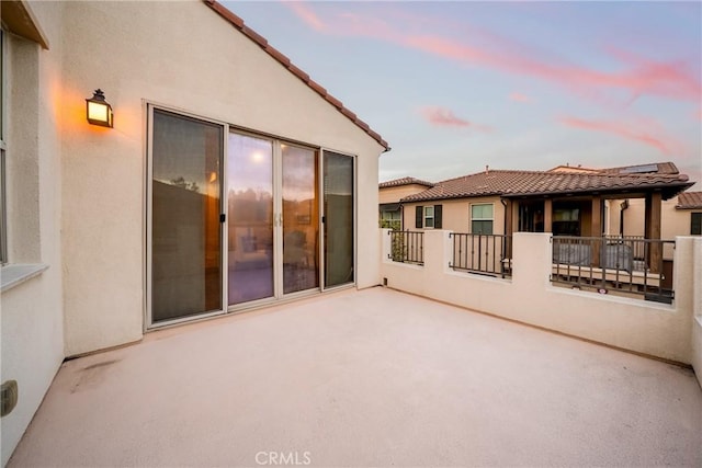 144 Borrego, Irvine, CA 92618 - view of patio terrace at dusk