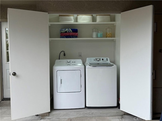 28181 Sorrento Unit 97, Laguna Niguel, CA 92677 - clothes washing area featuring washing machine and clothes dryer