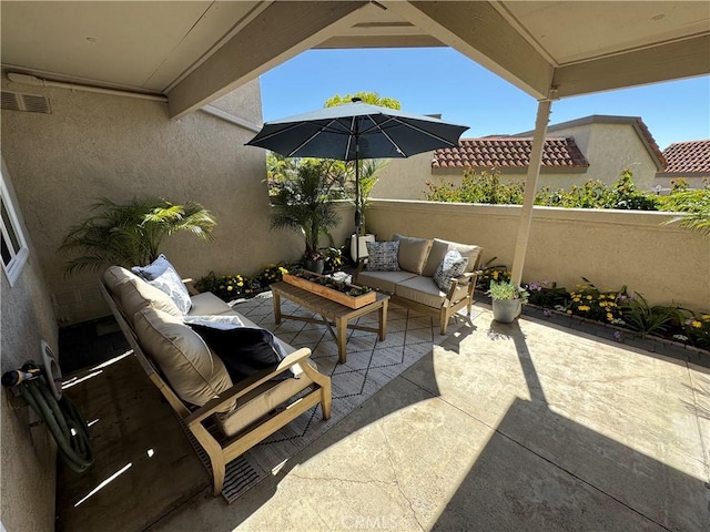 view of patio with visible vents and an outdoor hangout area