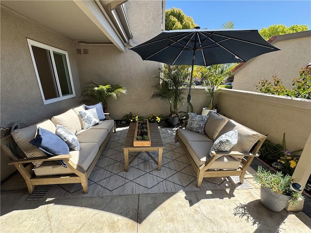 view of patio / terrace with an outdoor living space