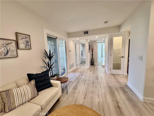 28181 Sorrento Unit 97, Laguna Niguel, CA 92677 - corridor featuring light wood finished floors and baseboards