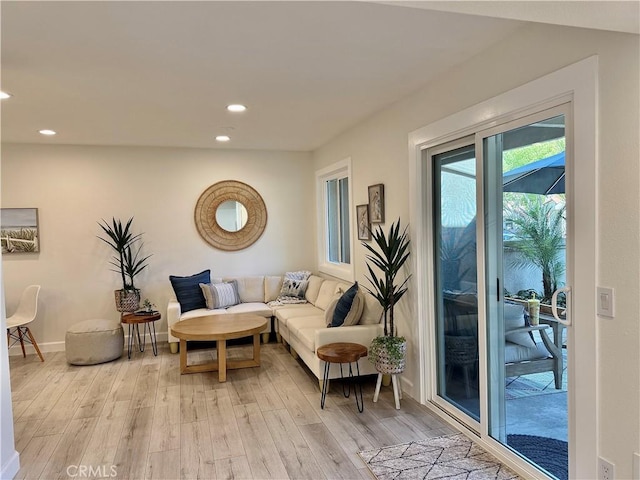 28181 Sorrento Unit 97, Laguna Niguel, CA 92677 - living room featuring light wood-style floors, recessed lighting, and baseboards