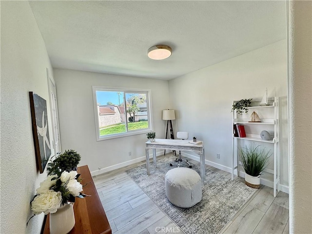 28181 Sorrento Unit 97, Laguna Niguel, CA 92677 - office with wood finished floors, a textured ceiling, and baseboards