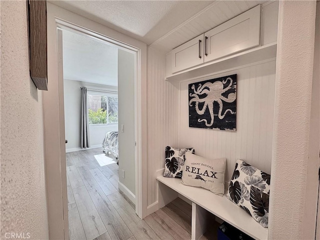 28181 Sorrento Unit 97, Laguna Niguel, CA 92677 - mudroom featuring light wood-style flooring and baseboards
