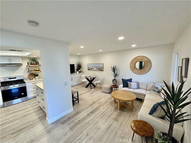 28181 Sorrento Unit 97, Laguna Niguel, CA 92677 - living area featuring light wood-style floors, recessed lighting, and baseboards