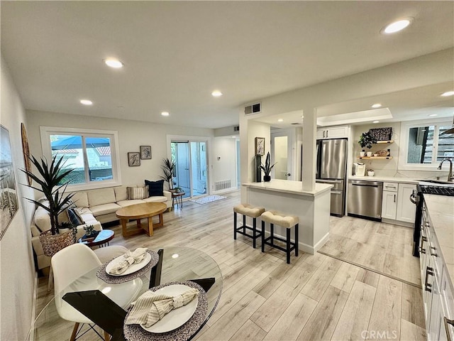 28181 Sorrento Unit 97, Laguna Niguel, CA 92677 - living room featuring light wood-type flooring and recessed lighting