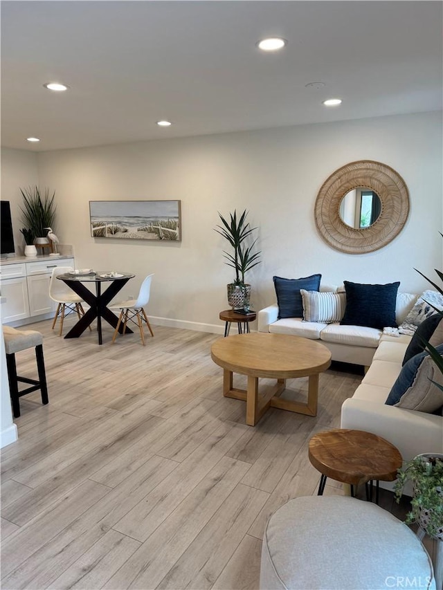 28181 Sorrento Unit 97, Laguna Niguel, CA 92677 - living area featuring light wood finished floors, recessed lighting, and baseboards