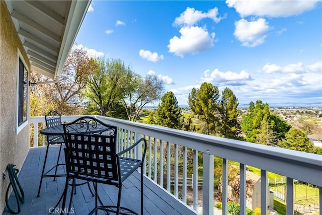 balcony featuring outdoor dining area