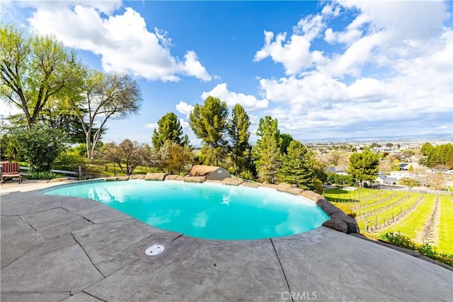 pool featuring a patio